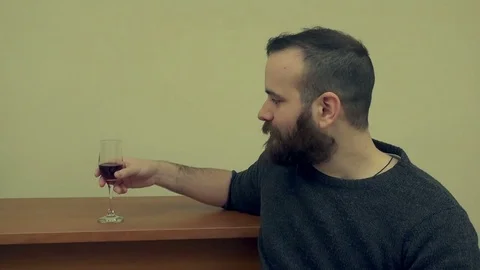 Young Man Drinking Wine Stock Footage