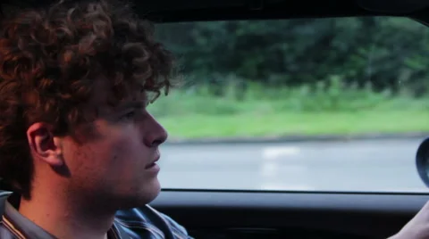 Young man driving to the autobahn Stock Footage 41546056