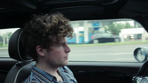 Young man driving to the autobahn Stock Footage 41570739