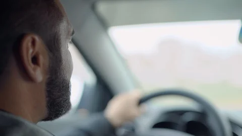 Young man driving car Stock Footage 99040802