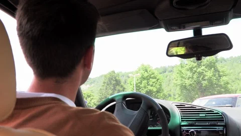 Young man driving a car Stock Footage 113799558