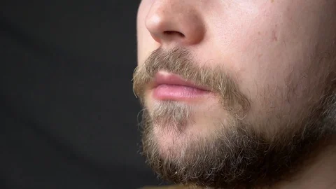 A young man eats cheesy pizza slow motion super close up Stock-Footage 124504709