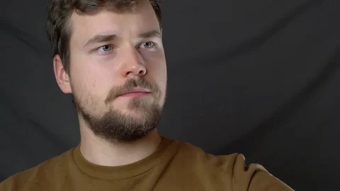 A young man eats pizza and does selfie Stock-Footage 124505068