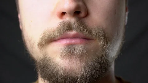 A young man eats pizza slow motion super close up Stock-Footage 124513494