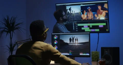 Young man editing video inside the room Stock Footage 101667372
