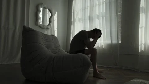 Young man in emotional distress, processing panic, shame and psychological Stock Footage 310946231