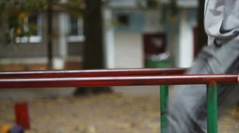 The young man is engaged on the bars Stock Footage 68207968