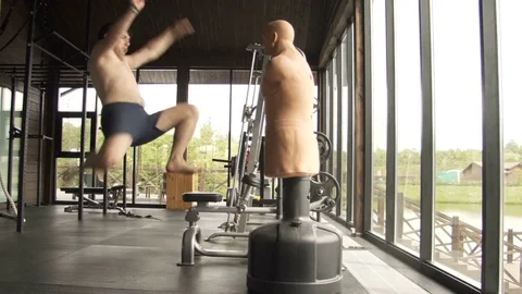 A young man is engaged in boxing in the gym Stock Footage 78917152