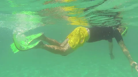 A young man is engaged in scuba diving. Stock Footage 94660738