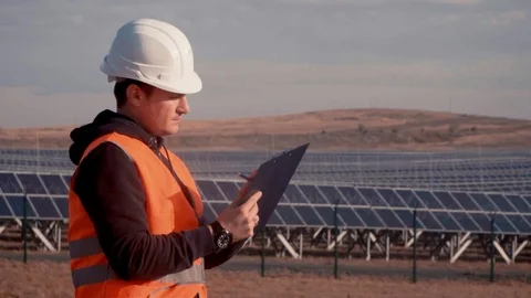 Young man engineer checking solar panel at solar power plant Video stock 100544031