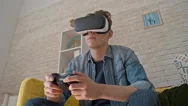 Young Man Enjoying Games In Vr Headset Stock Footage