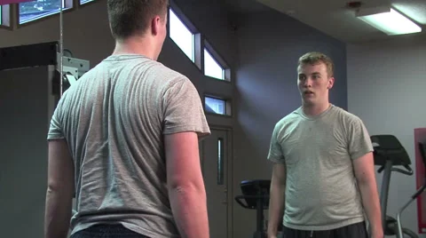 Young man exercising his upper body. Stock Footage 49863002