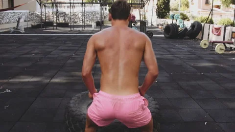 Young Man Exercising Outdoors Doing the Barbell Back Squat Stock Footage 138122821