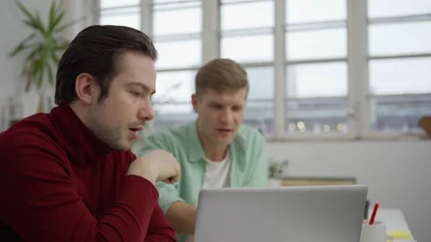 Young man explaining idea to client Stock Footage 142150732