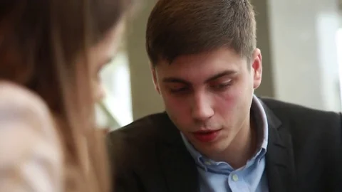 Young man explains the concept of business Stock Footage 74304495