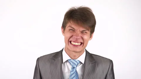 Young man expression shows emotions in front of the camera. fool around Stock Footage 92789986