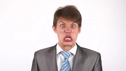 Young man expression shows emotions in front of the camera. fool around Stock Footage 92825591