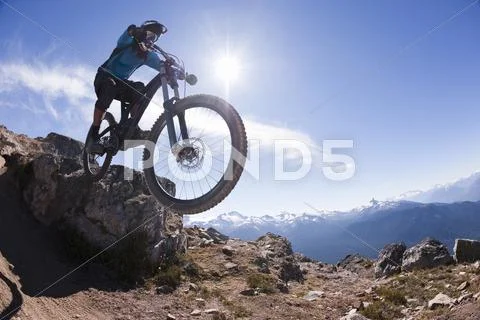 Young Man Extreme Mountain Biking, Whistler, Bc, Canada