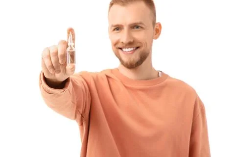 Young man with eye drops on white background, closeup Stock Photos