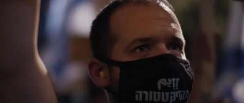 A young man in face mask shouting protesting Stock Footage 152847668