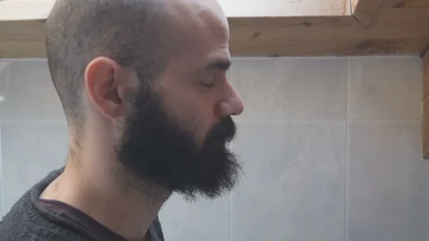 Young Man Face in Profile Peeing Stock Footage 88911858