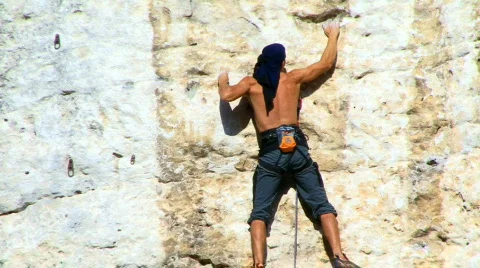 Young man Falls from the Rock Stockbeeldmateriaal 852990