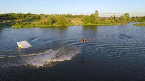 Young Man Fast Rides On A Wakeboard. Aerial View Stock Footage 101877492