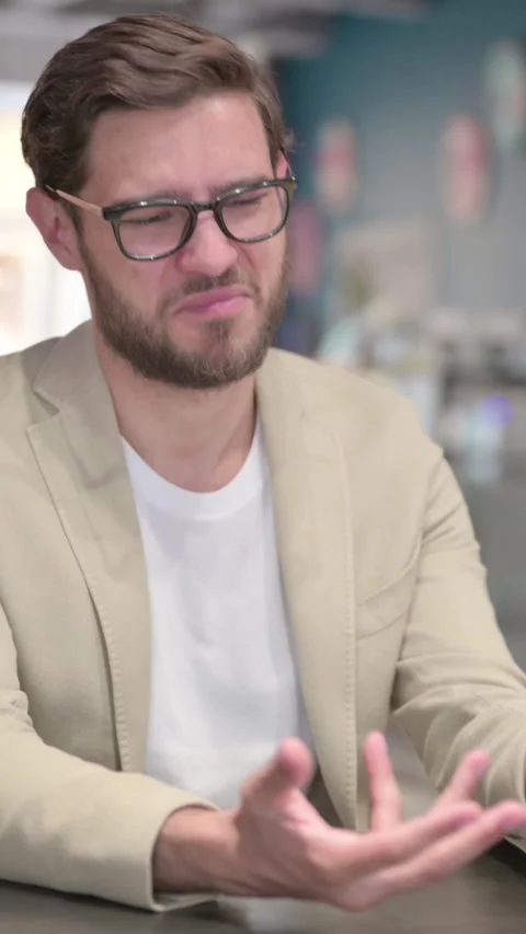Young Man Feeling Frustrated, Disappointed at Work, Vertical Video Stock Footage 342007742