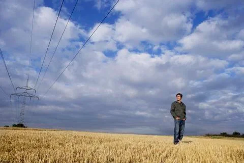 Young man in field Stock Photos