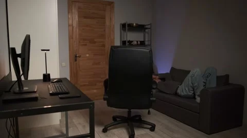 Young man finishing computer work rolling to sofa relaxing home authentic Stock Footage 315413910