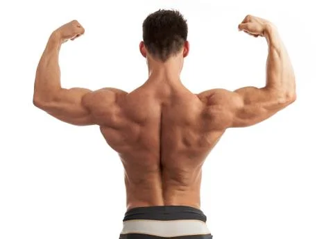 Young man flexing his arm and back muscles Stock Photos