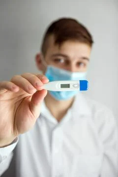 Young Man in Flu Mask Stock-Fotos