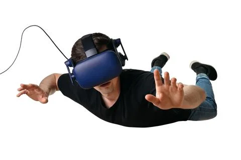 Young man flying in zero gravity space and experiencing virtual reality in 3d Stock Photos
