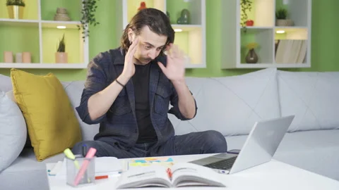 Young man with focus problem has trouble working. Stock Footage 236552997