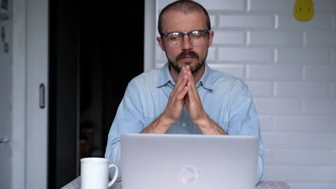Young man is focusing on work during working from home. Stock Footage 135980930