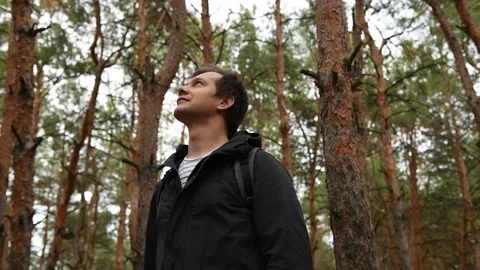 A young man in the forest Video stock 144950077