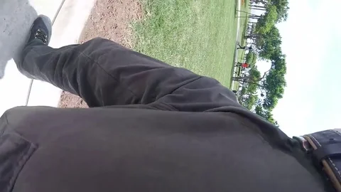 Young Man Forgot to Switch off his GoPro Camera. Going with Hiden Camera in Park Stock Footage 82839618