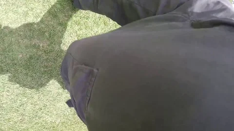 Young Man Forgot to Switch off his GoPro Camera, Speaking with Someone in Park Stock-Footage 82842980