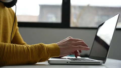 Young man freelancer entrepreneur using laptop online working from home Video stock 229778300