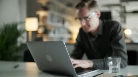 Young Man Freelancer Using Laptop Online Working From Office In Internet Stock Footage 132870067