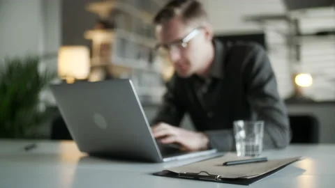 Young Man Freelancer Using Laptop Online Working From Office In Internet Stock Footage 132889931