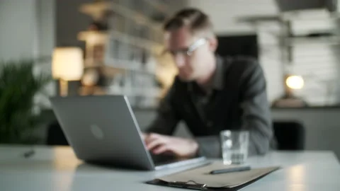 Young Man Freelancer Using Laptop Online Working From Office In Internet Stock Footage 132891266