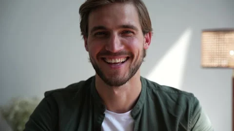 Young man freelancer using laptop online working from home in internet Stock Footage 220869280