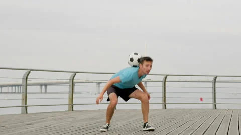 Young man freestyler shows upper body tricks by handrail Stock Footage 202101159