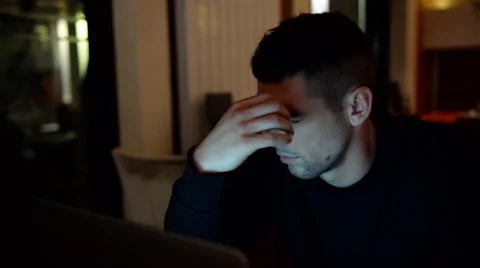 Young man frustrated about writing an email Stock Footage 61290260