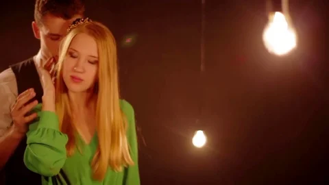 Young man gently strokes his girlfriend Stock Footage 73845219