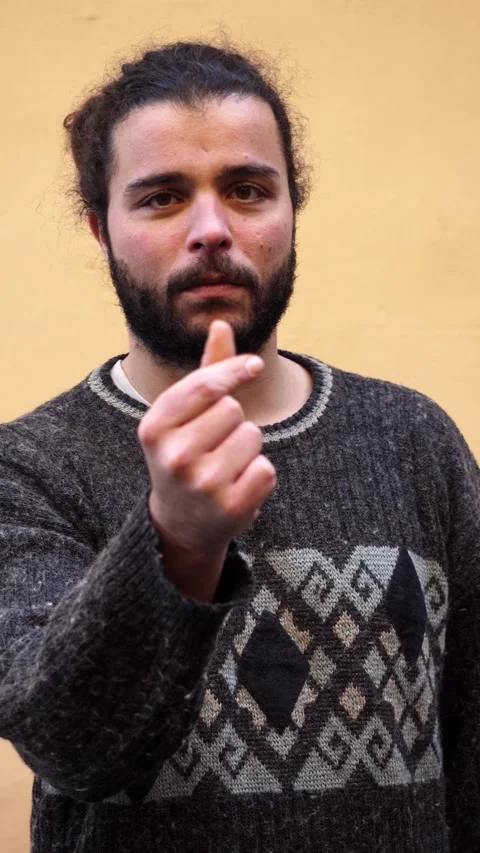 Young man gestures asking for money using expressive hands and attitude Video stock 328644573