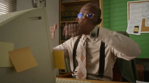 Young Man Gesturing in Frustration at Retro Computer Screen Stock Footage 341422635