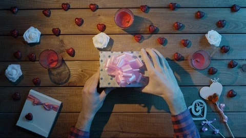 Young man gets empty box as holiday gift, top view Stock Footage 87975315