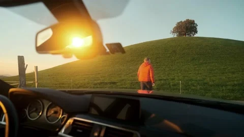 A young man gets out of the car after taking a wrong turn. Stock Footage 201165057